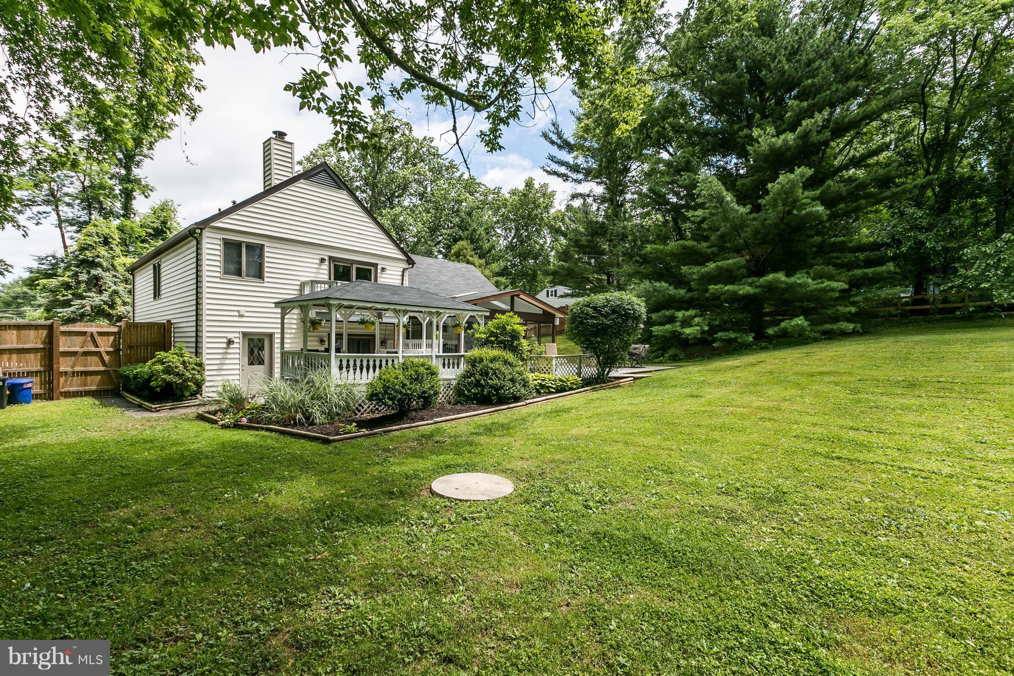 2905 Paper Mill Road Phoenix, MD 21131 - Photo 1 of 29 a front view of a house with a yard