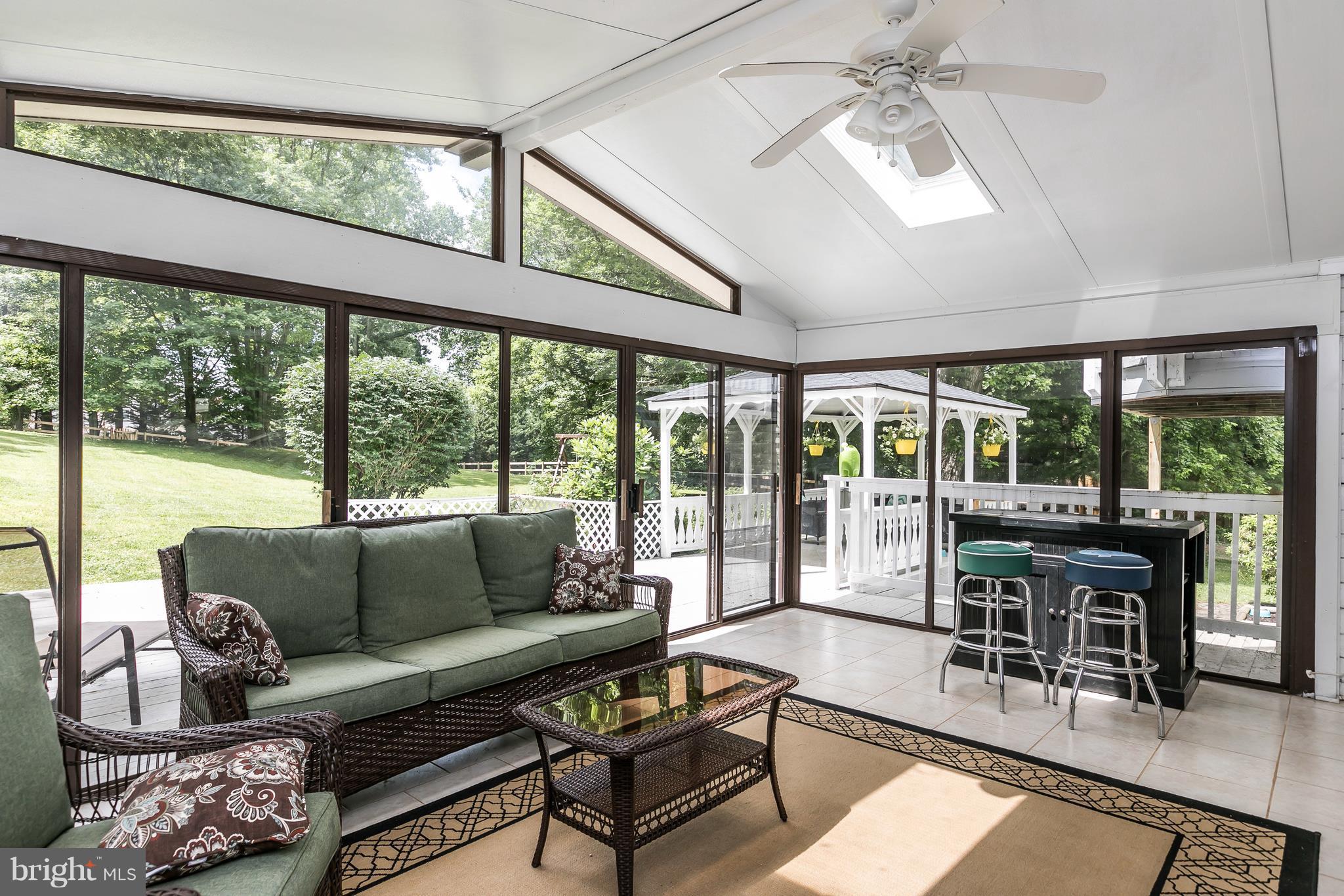 2905 Paper Mill Road Phoenix, MD 21131 - Photo 17 of 29 a living room with furniture and a large window