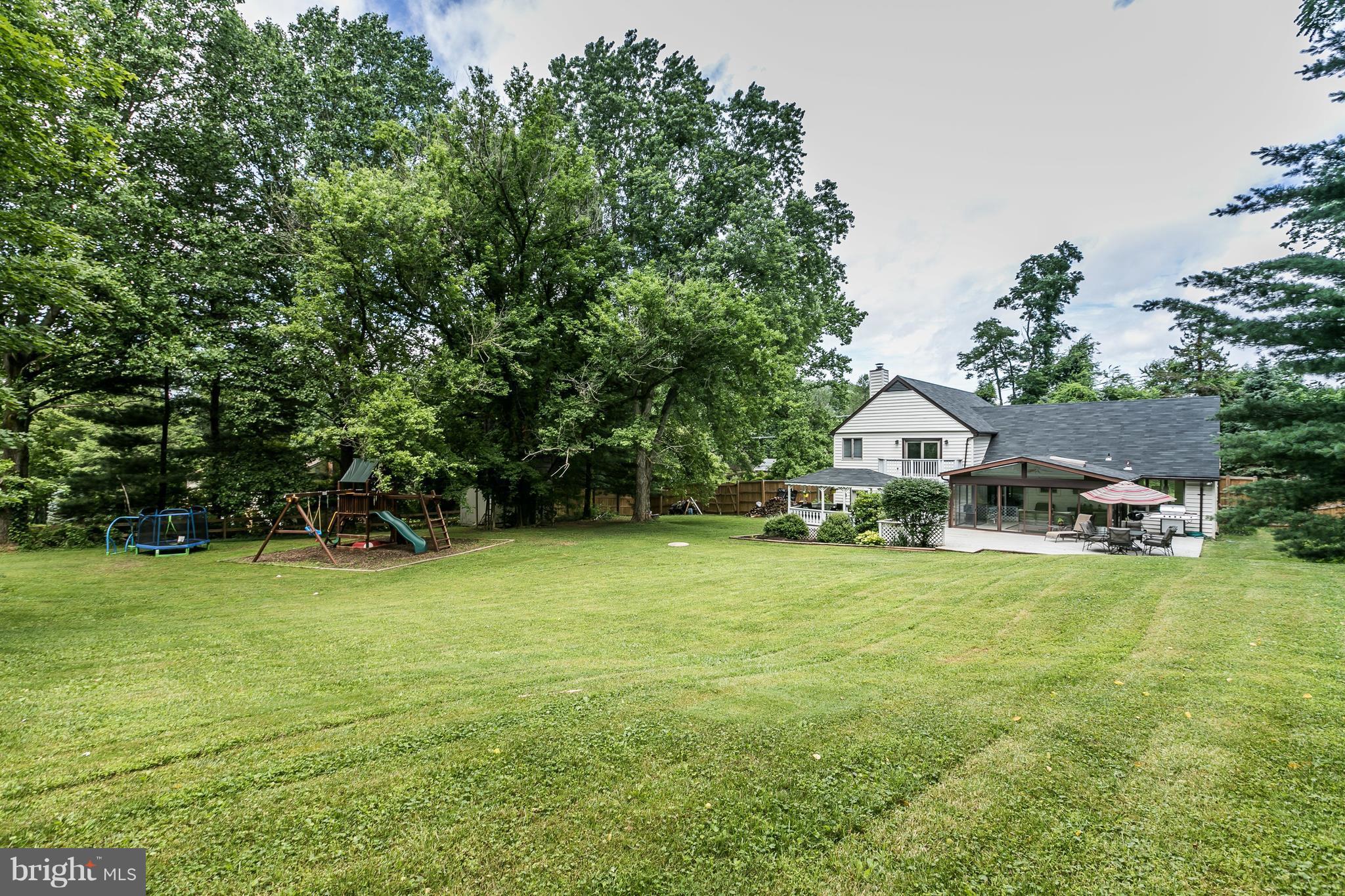 2905 Paper Mill Road Phoenix, MD 21131 - Photo 27 of 29 a front view of a house with a yard and trees
