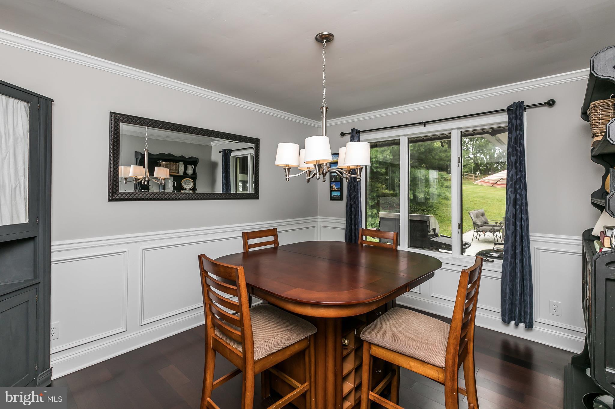 2905 Paper Mill Road Phoenix, MD 21131 - Photo 5 of 29 a dining room with furniture window wooden floor