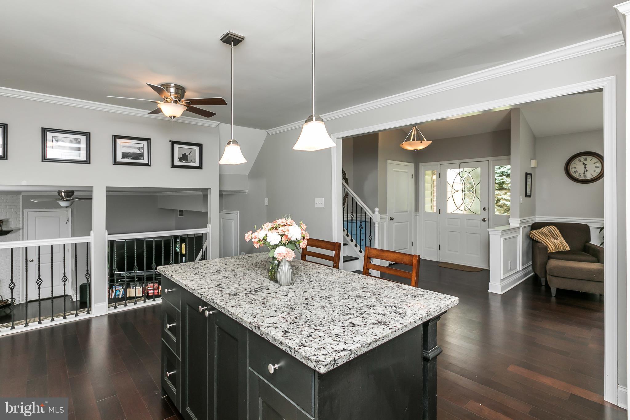 2905 Paper Mill Road Phoenix, MD 21131 - Photo 8 of 29 a kitchen with a table chairs and wooden floor