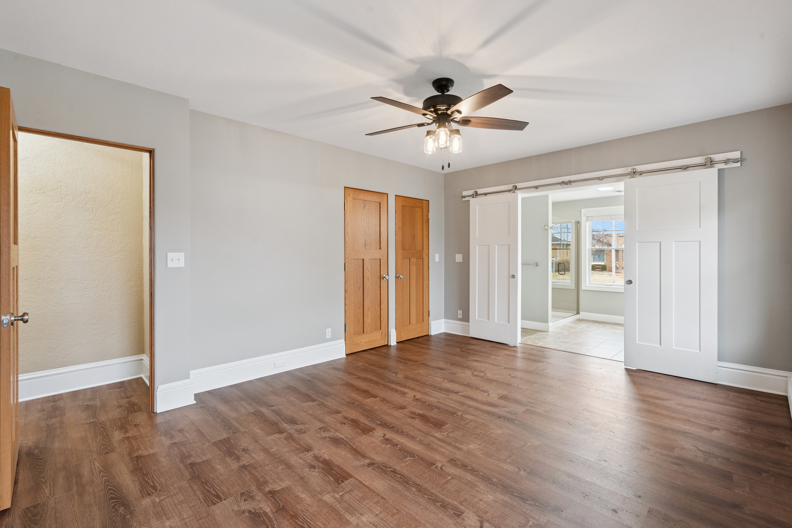 1416 6th Street Orion, IL 61273 - Photo 16 of 48 a view of an empty room with wooden floor