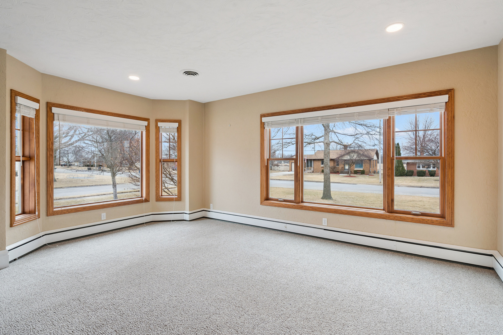 1416 6th Street Orion, IL 61273 - Photo 9 of 48 an empty room with windows and view of sky view