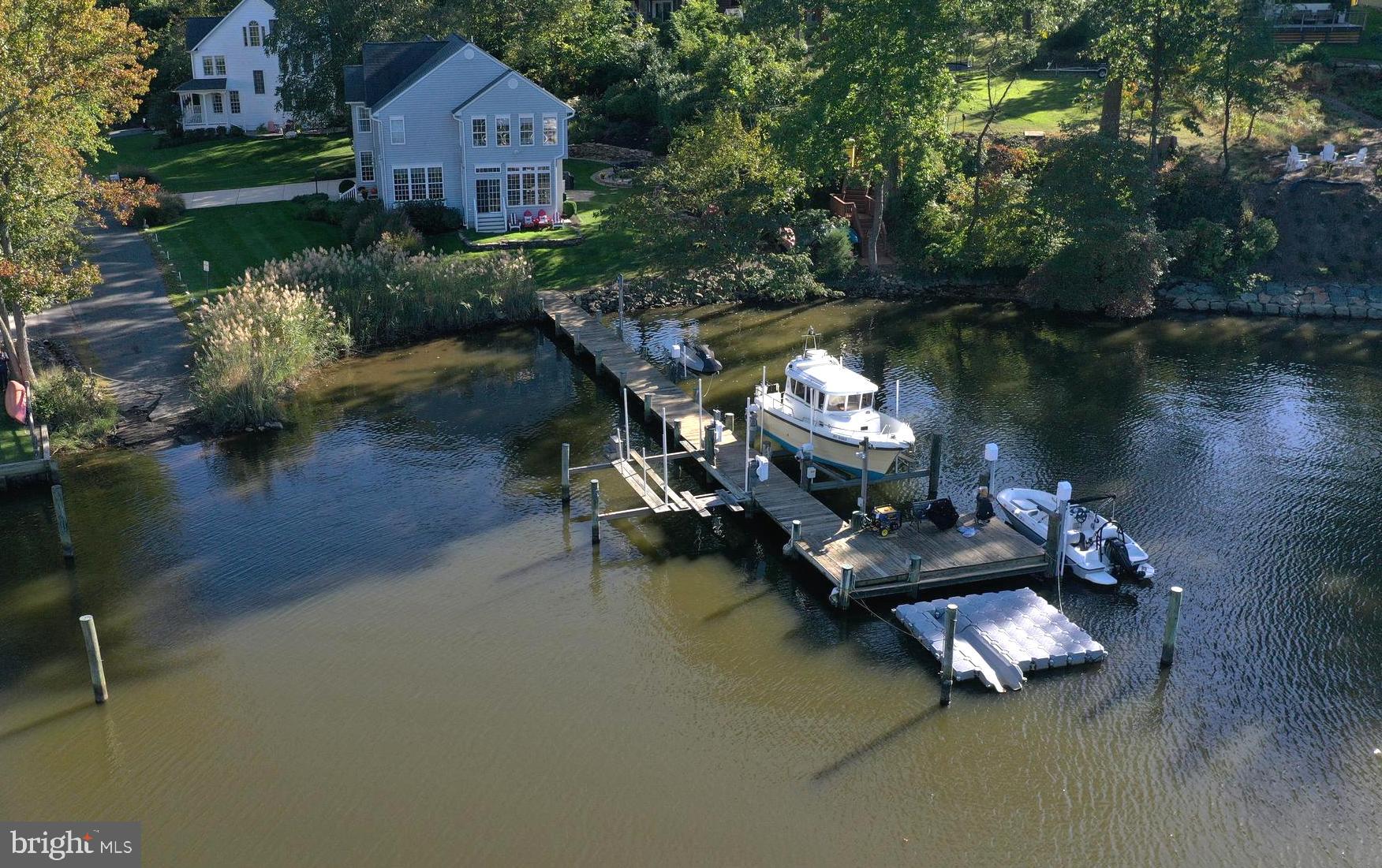 105 Shore Road Arnold, MD 21012 - Photo 2 of 55 Shared Pier w/Lift & Floating Dock on left & end