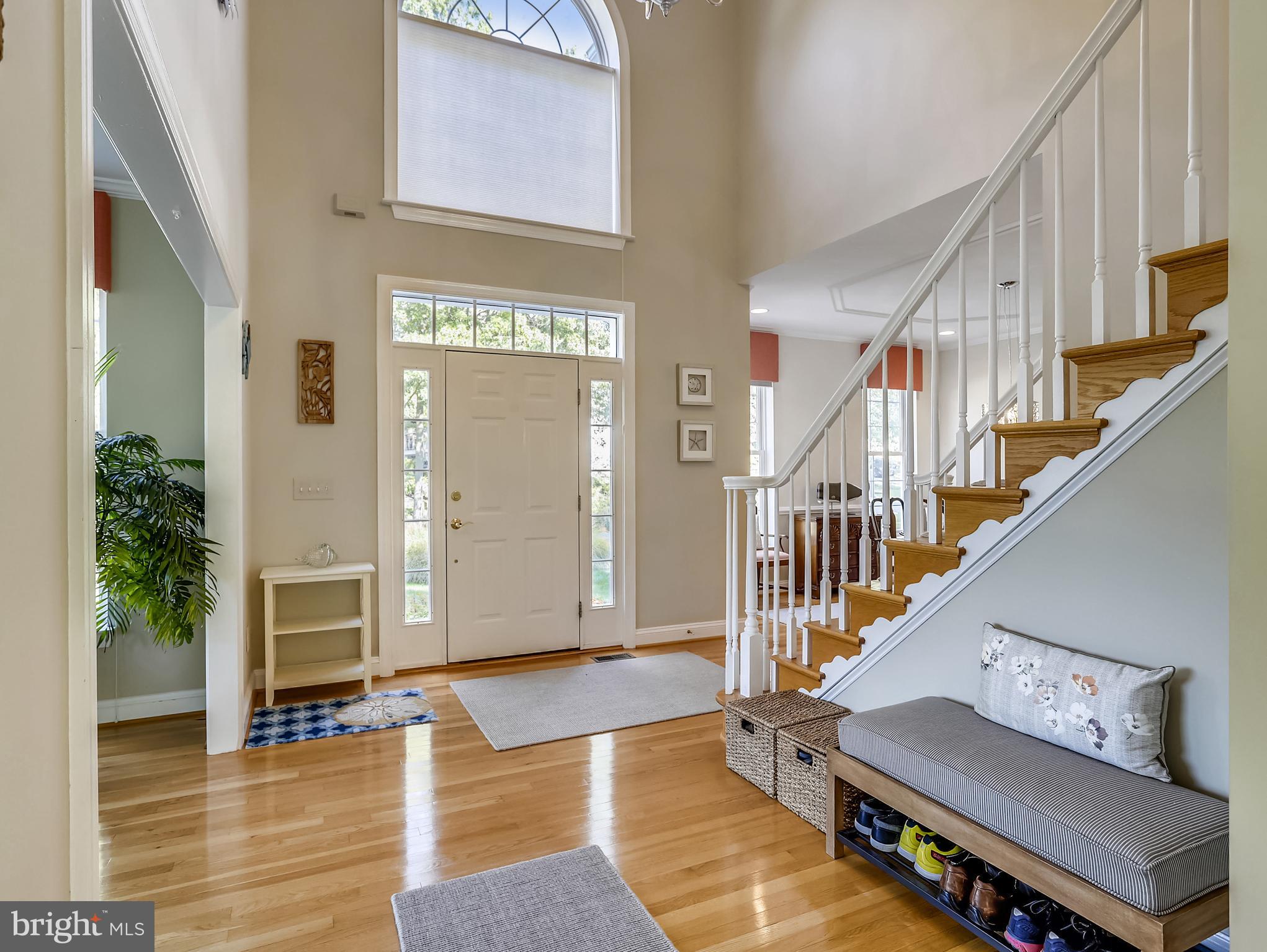 105 Shore Road Arnold, MD 21012 - Photo 19 of 55 Dramatic 2-Story Foyer with Hardwood Flooring