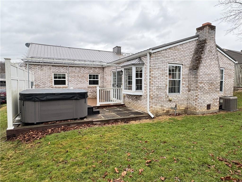 210 Carson Street Springdale, PA 15144 - Photo 2 of 33 REAR VIEW WITH DECK AND HOT TUB