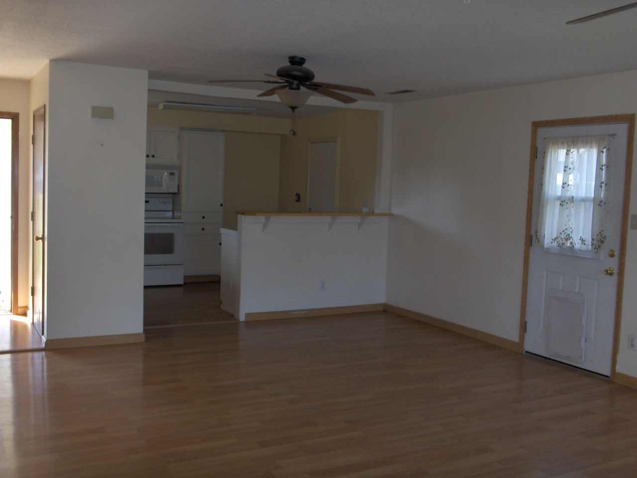 1194 Echo Road Redding, CA 96002 - Photo 3 of 17 a view of a kitchen with a sink and cabinets