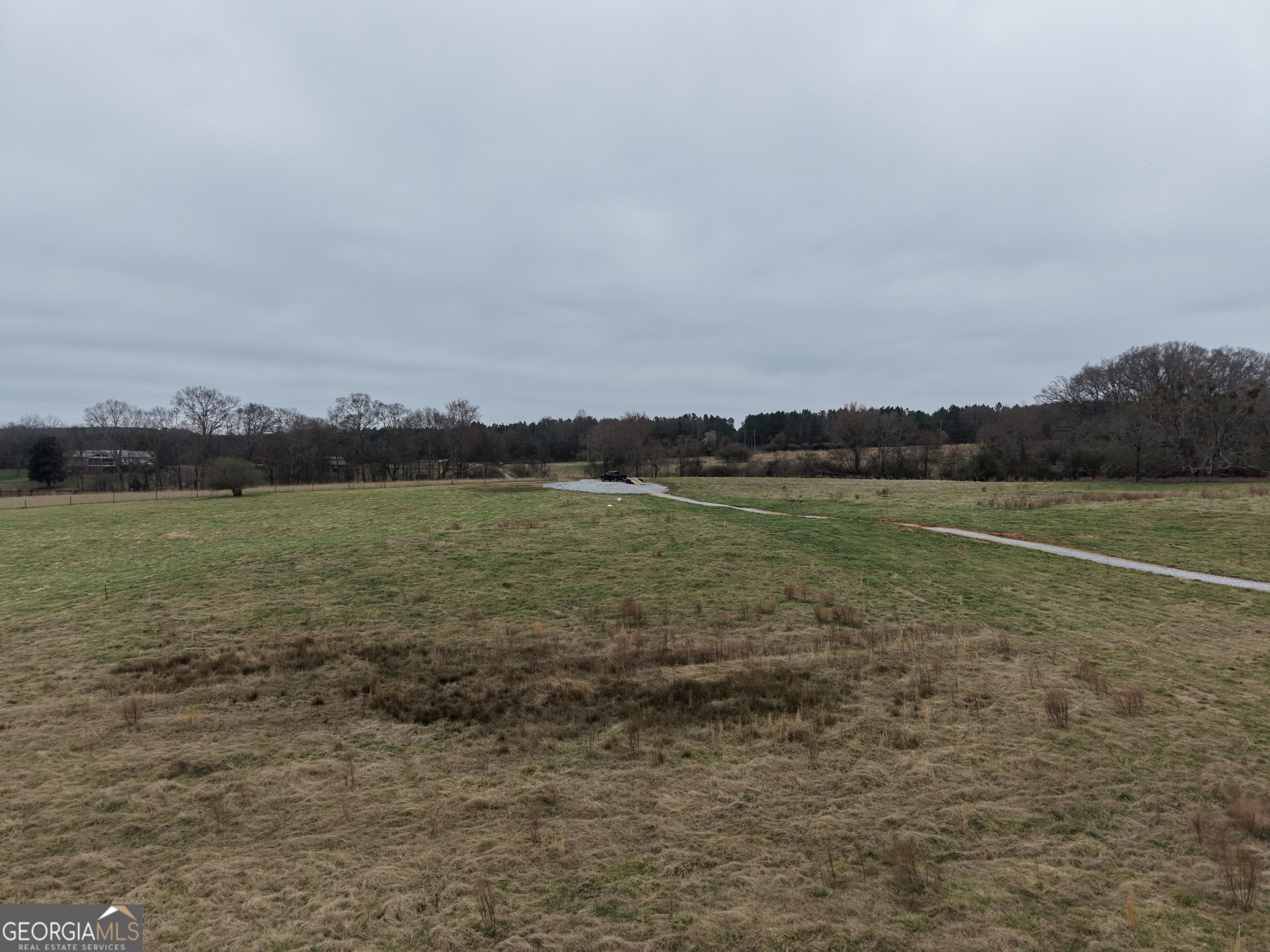 9 Red Rose Court Nicholson, GA 30565 - Photo 43 of 55 a view of a water with houses in back