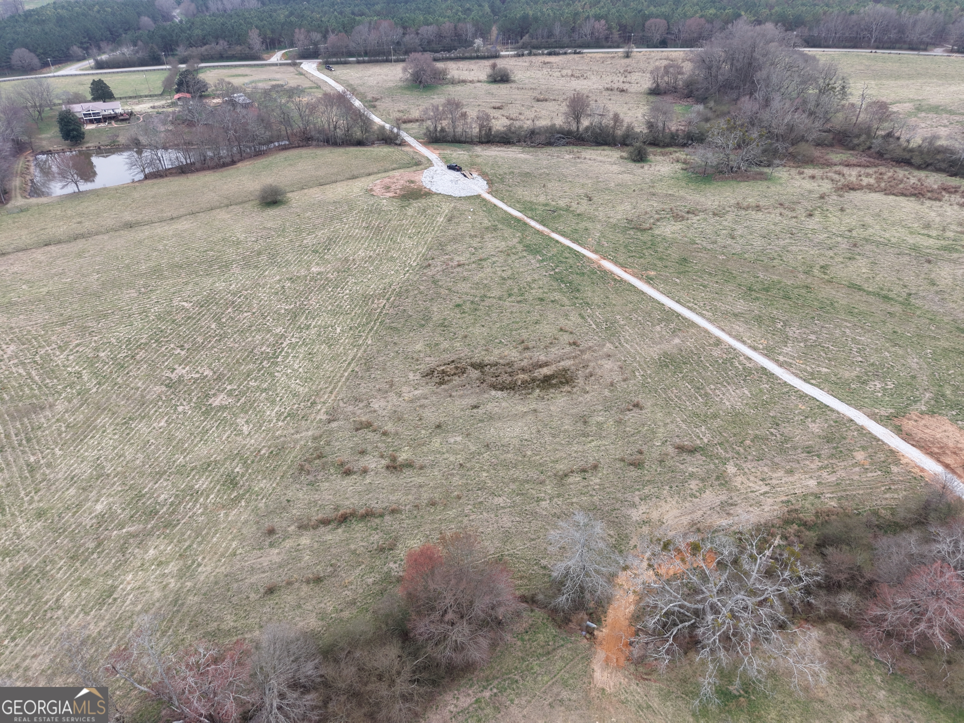 9 Red Rose Court Nicholson, GA 30565 - Photo 52 of 55 a view of a dry yard with wooden fence