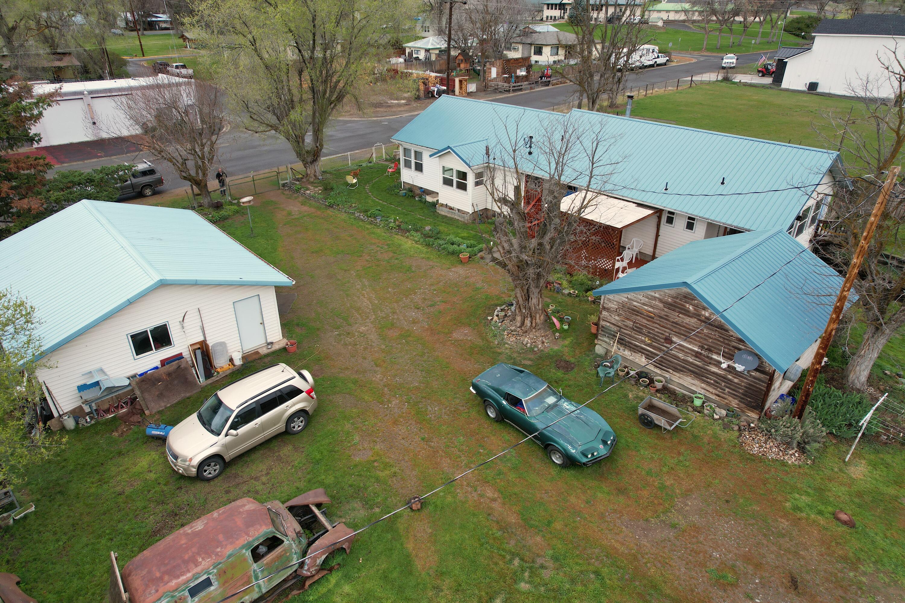 298 Main Street Monument, OR 97864 - Photo 61 of 66 an aerial view of a house with a yard basket ball court and outdoor seating