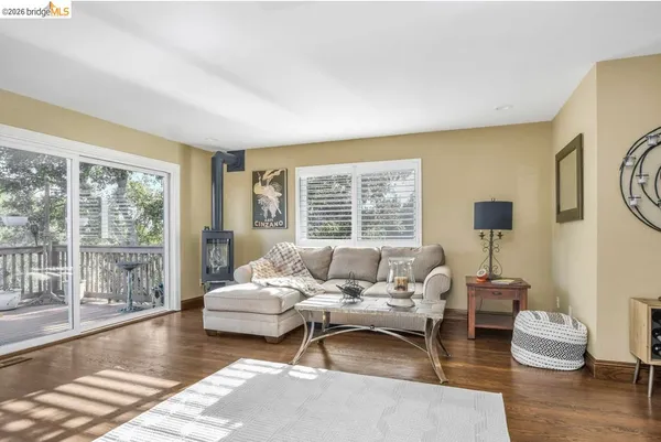 a living room with furniture and a table