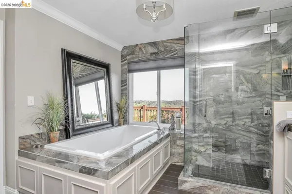 a view of a living room and a large window