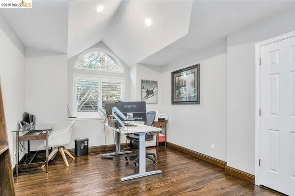 a kitchen with granite countertop a sink and cabinets