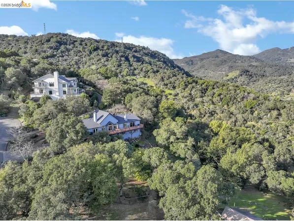 a view of a yard next to a yard