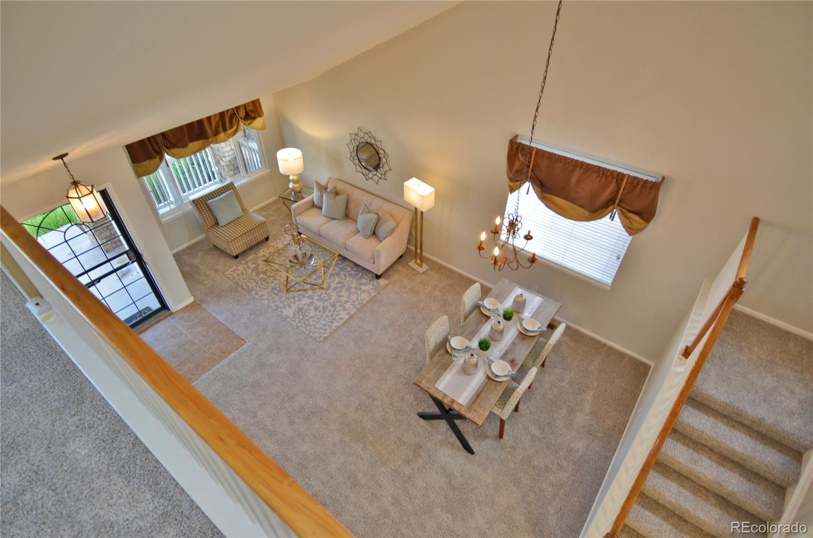 10699 Wynspire Way Highlands Ranch, CO 80130 - Photo 21 of 40 a view of living room with furniture and rug