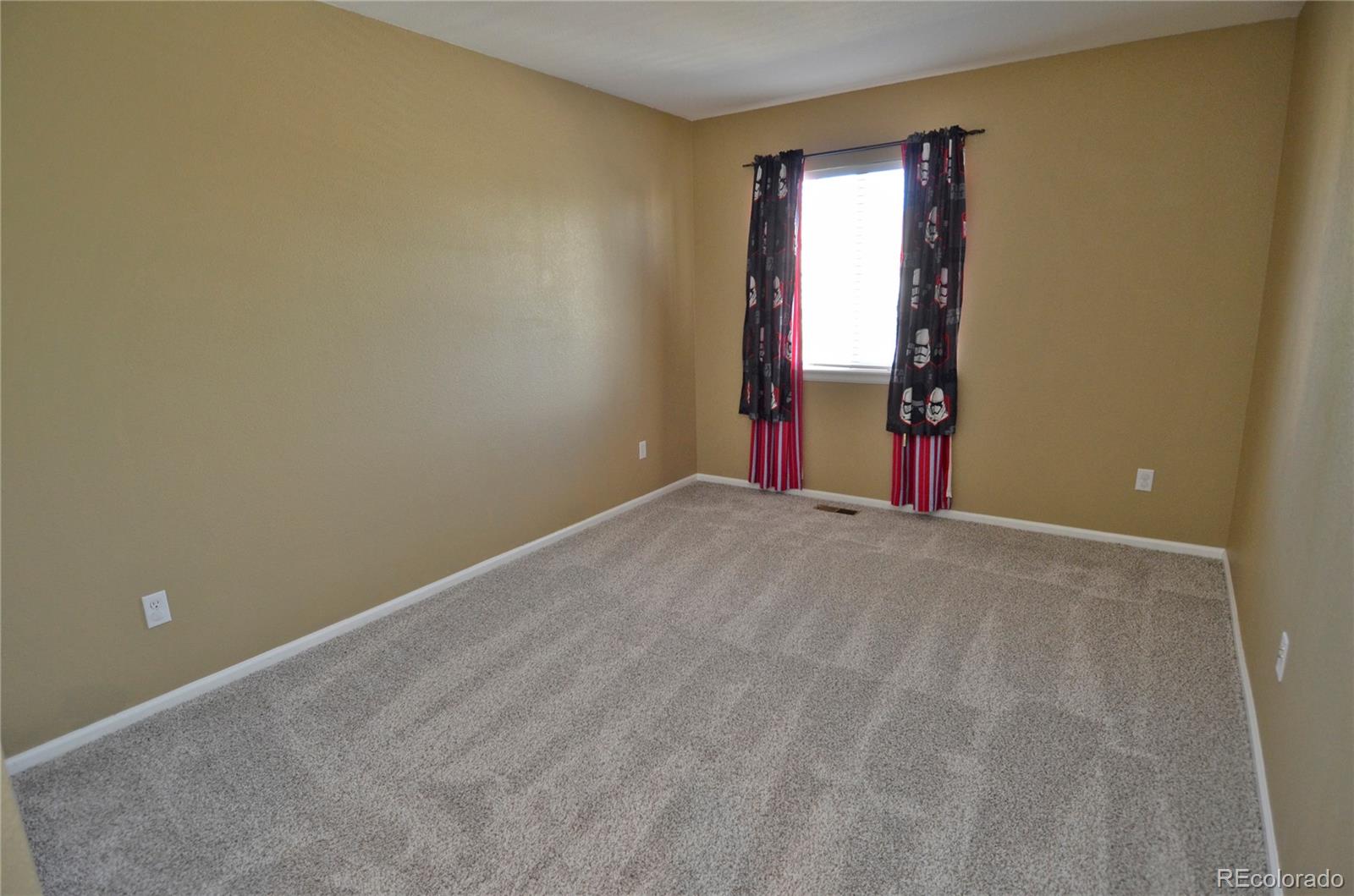 10699 Wynspire Way Highlands Ranch, CO 80130 - Photo 31 of 40 a view of empty room with windows