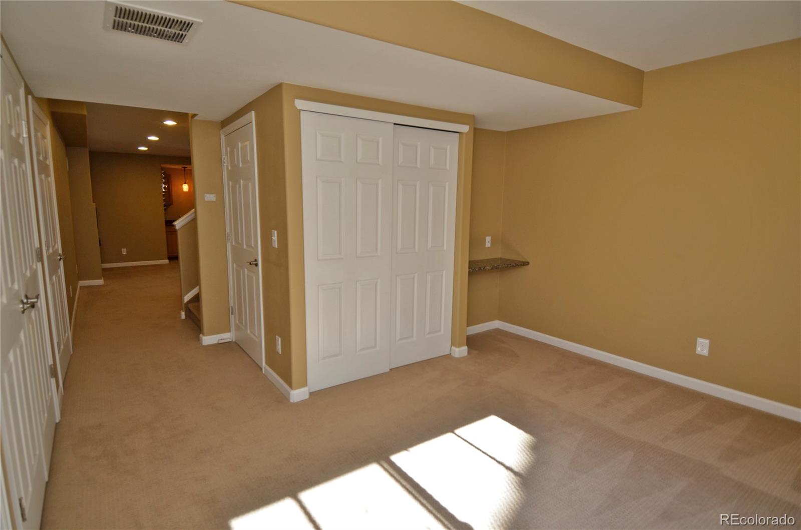 10699 Wynspire Way Highlands Ranch, CO 80130 - Photo 36 of 40 a view of an empty room