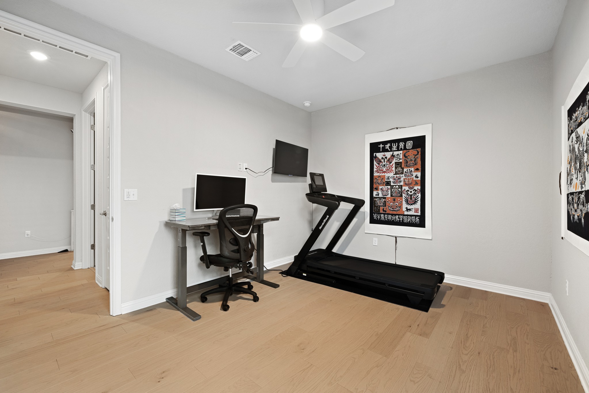 8405 Hubble Walk Austin, TX 78744 - Photo 22 of 36 Office area featuring a ceiling fan and light wood-style floors