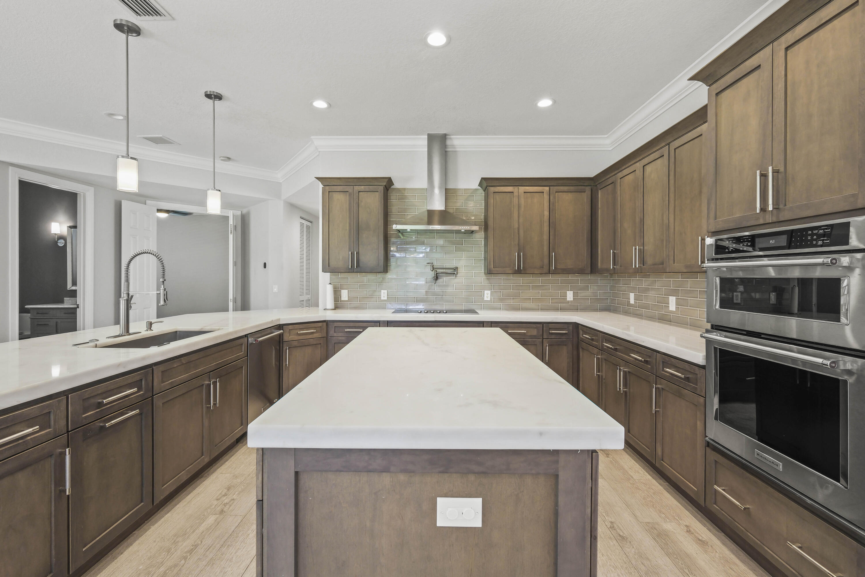 8620 Cobblestone Point Circle Boynton Beach, FL 33472 - Photo 13 of 42 a kitchen with a stove a sink and a refrigerator