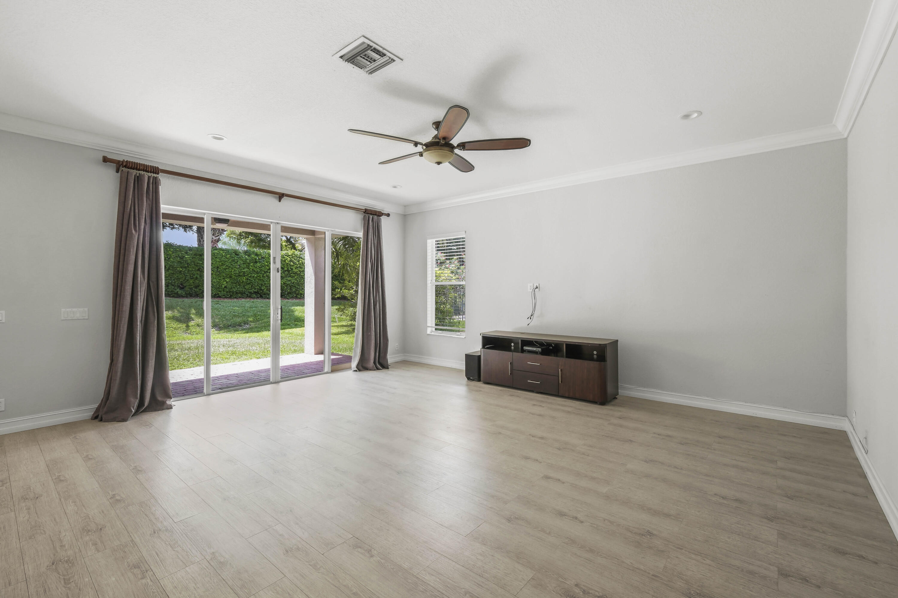 8620 Cobblestone Point Circle Boynton Beach, FL 33472 - Photo 14 of 42 a view of an empty room with a window