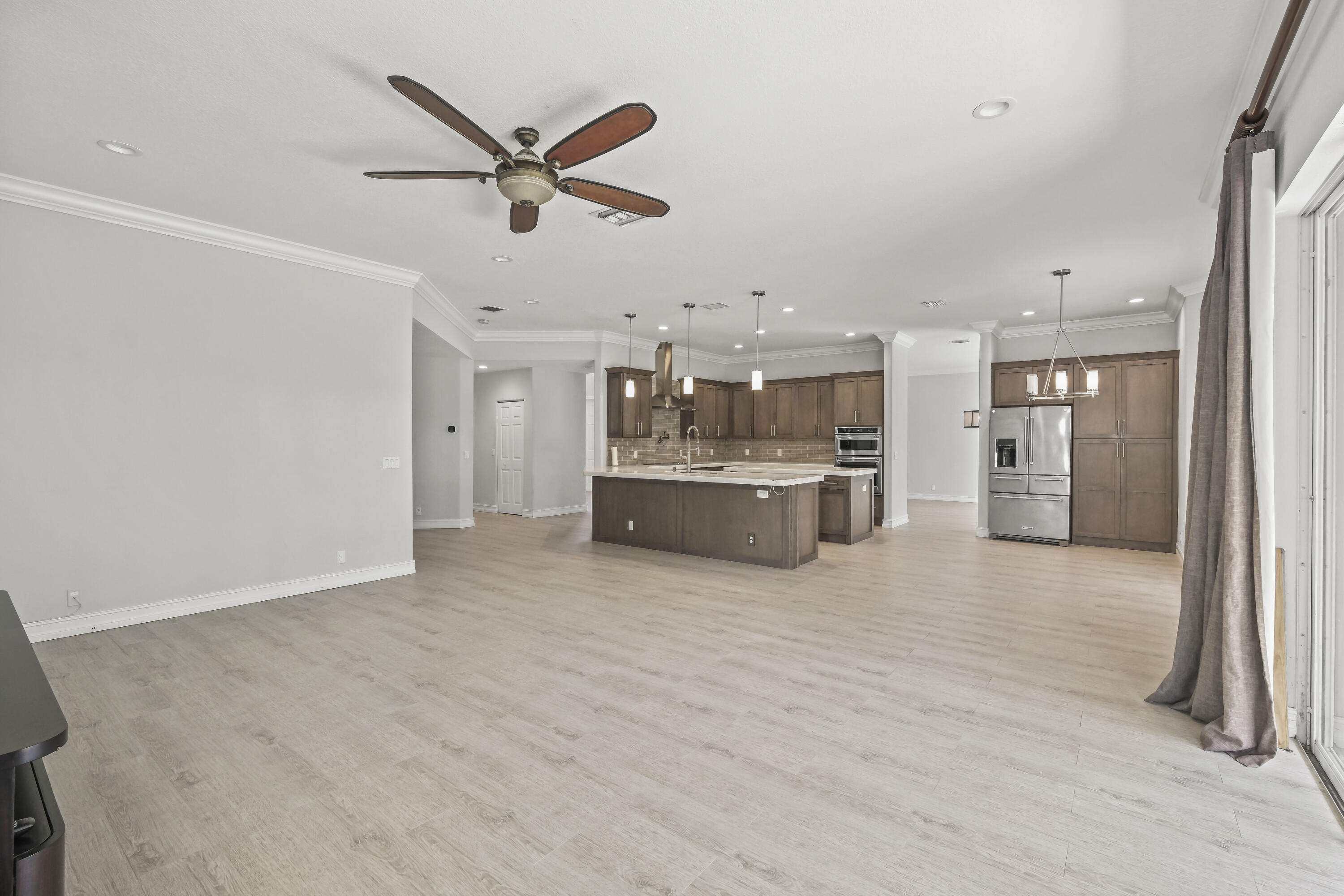 8620 Cobblestone Point Circle Boynton Beach, FL 33472 - Photo 16 of 42 a view of a kitchen with a stove and a refrigerator