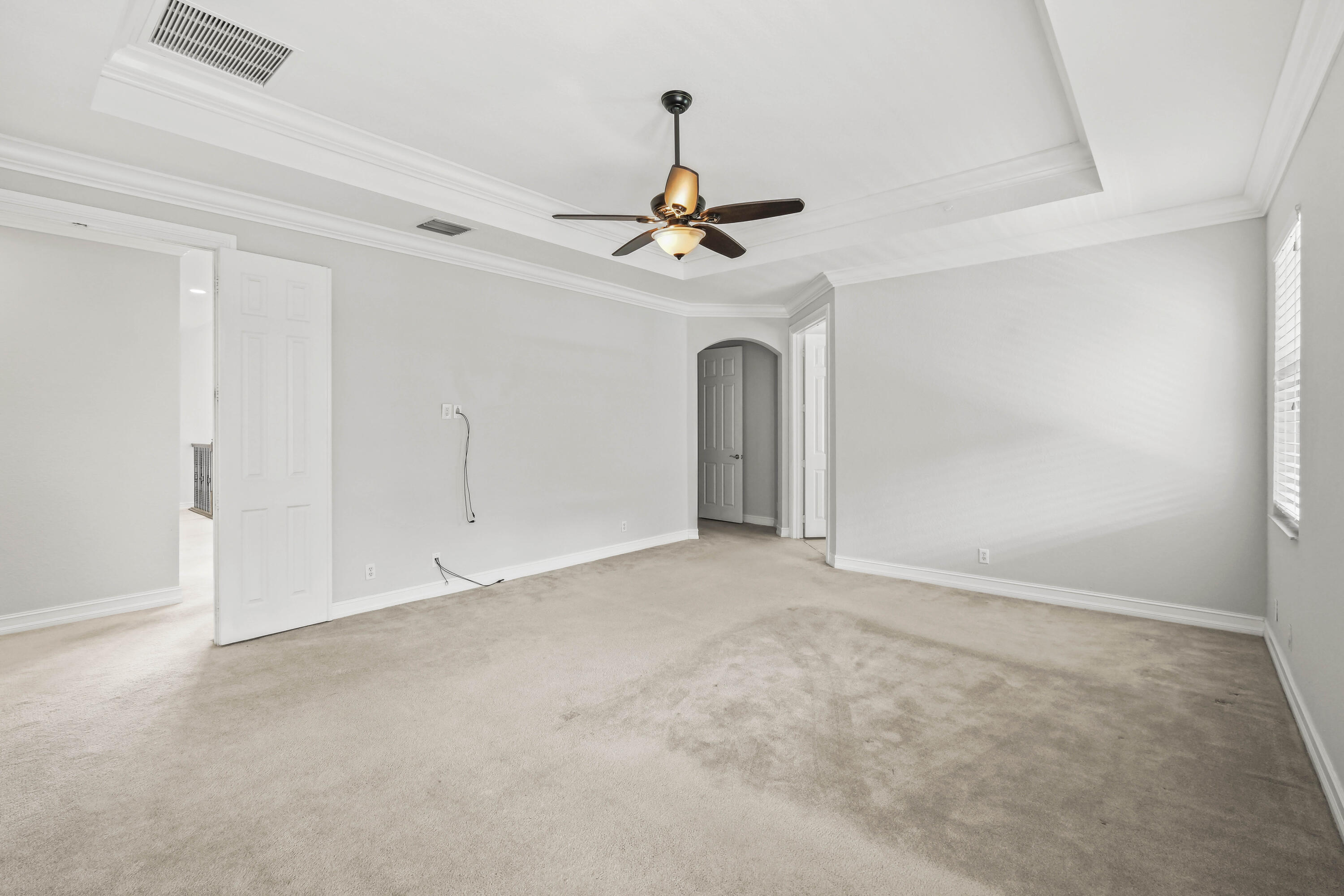 8620 Cobblestone Point Circle Boynton Beach, FL 33472 - Photo 21 of 42 a view of empty room with ceiling fan
