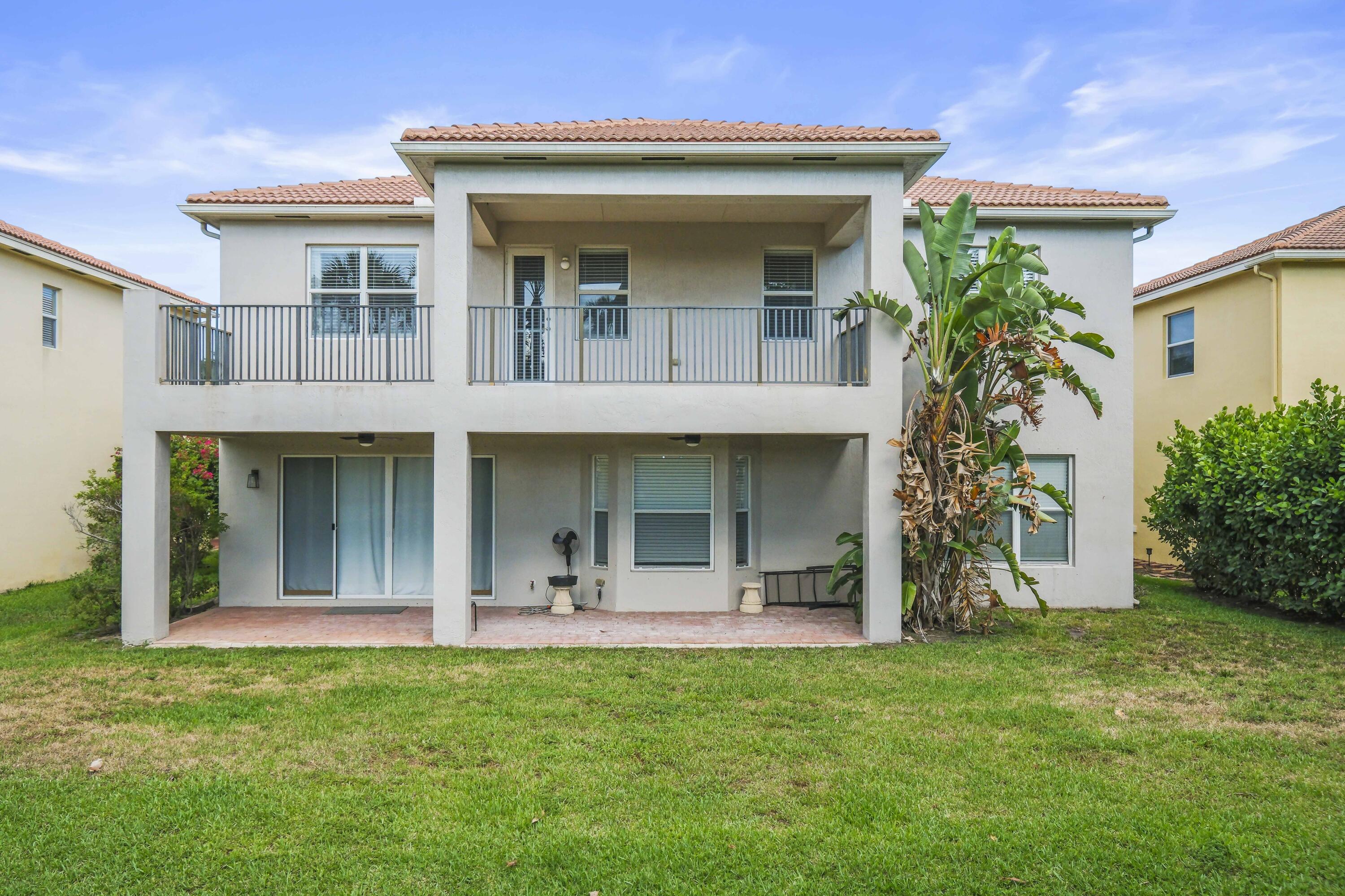 8620 Cobblestone Point Circle Boynton Beach, FL 33472 - Photo 25 of 42 front view of a house with a yard