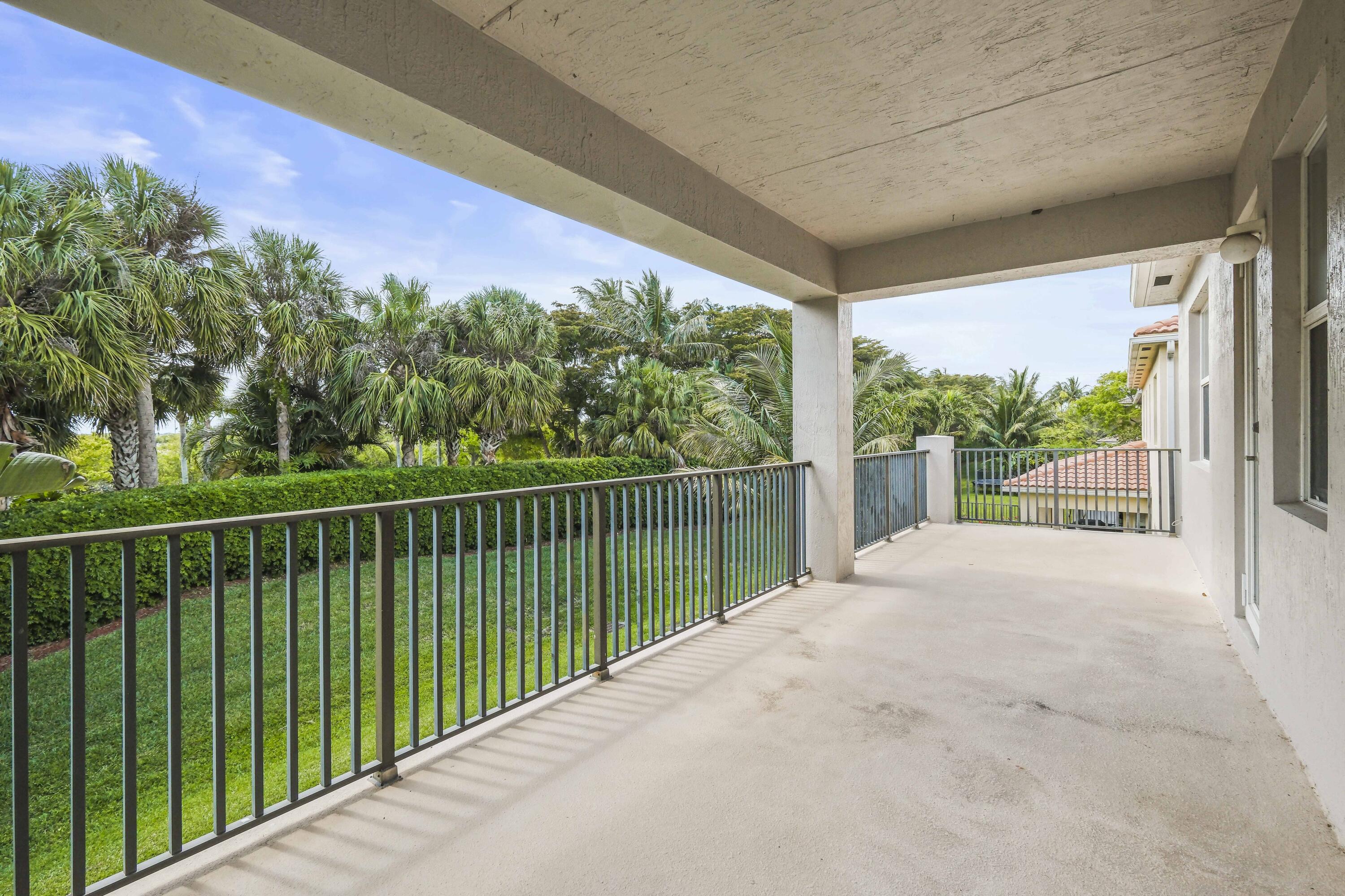 8620 Cobblestone Point Circle Boynton Beach, FL 33472 - Photo 27 of 42 a view of a balcony with an outdoor space