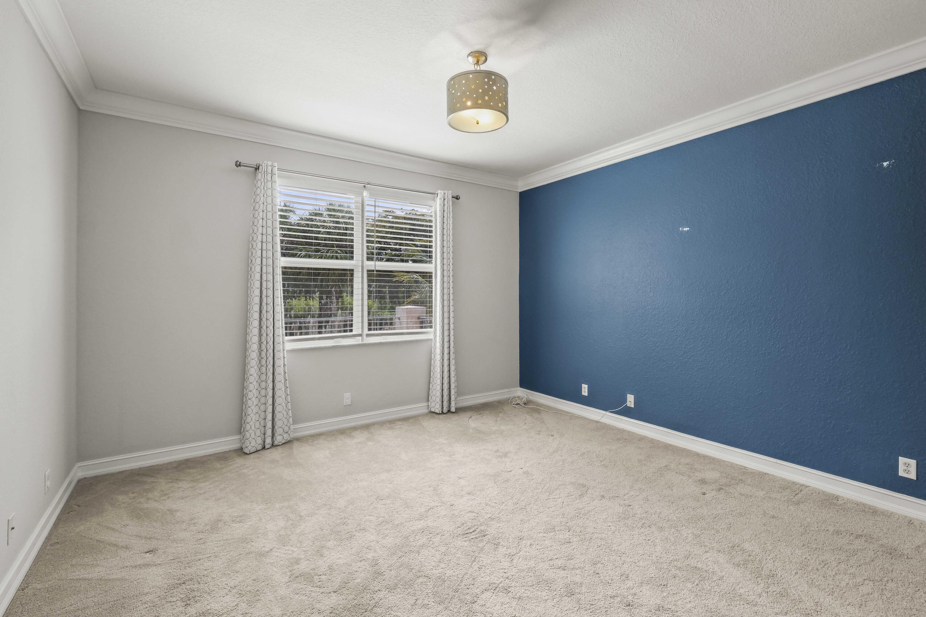 8620 Cobblestone Point Circle Boynton Beach, FL 33472 - Photo 28 of 42 an empty room with window