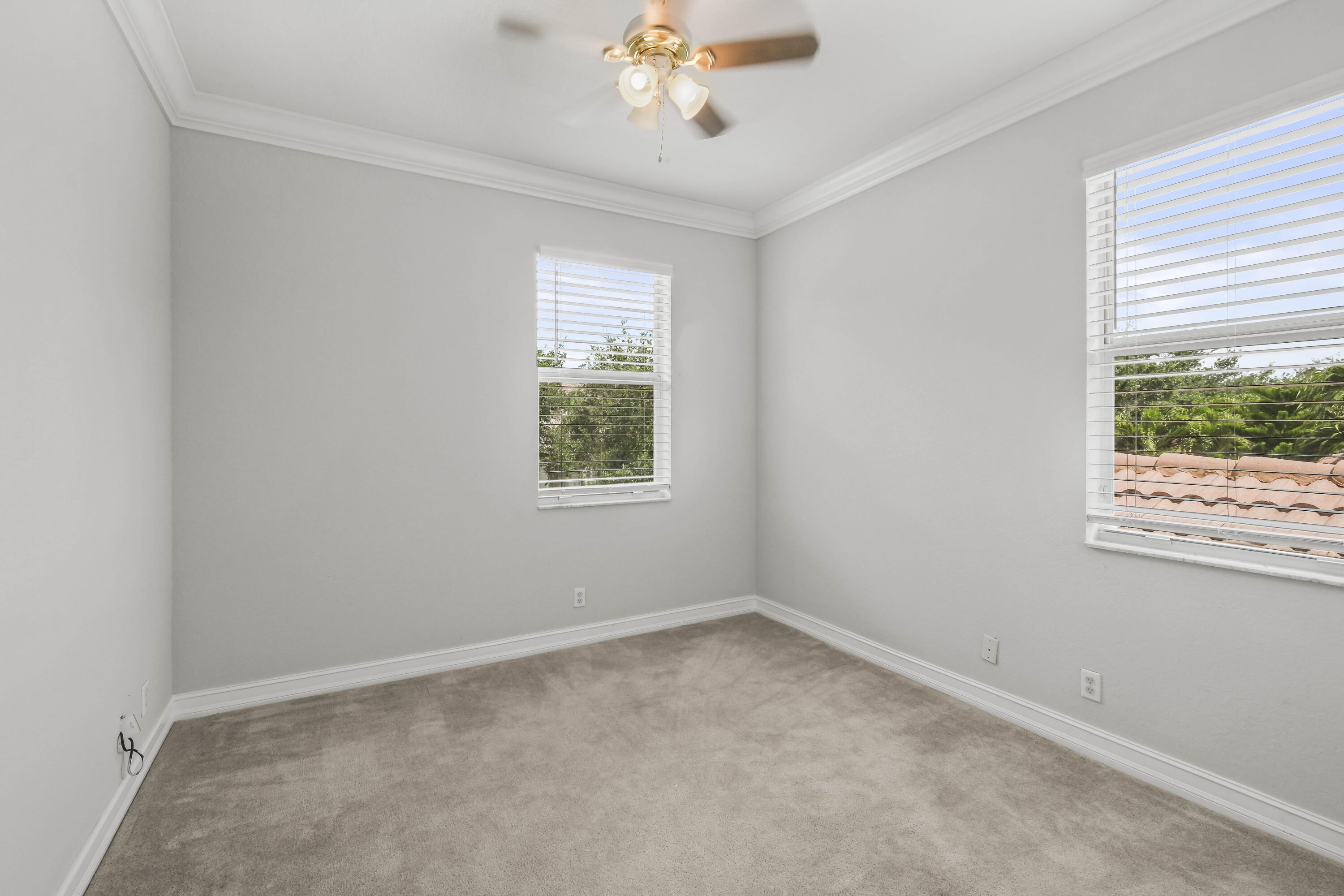 8620 Cobblestone Point Circle Boynton Beach, FL 33472 - Photo 34 of 42 an empty room with a window