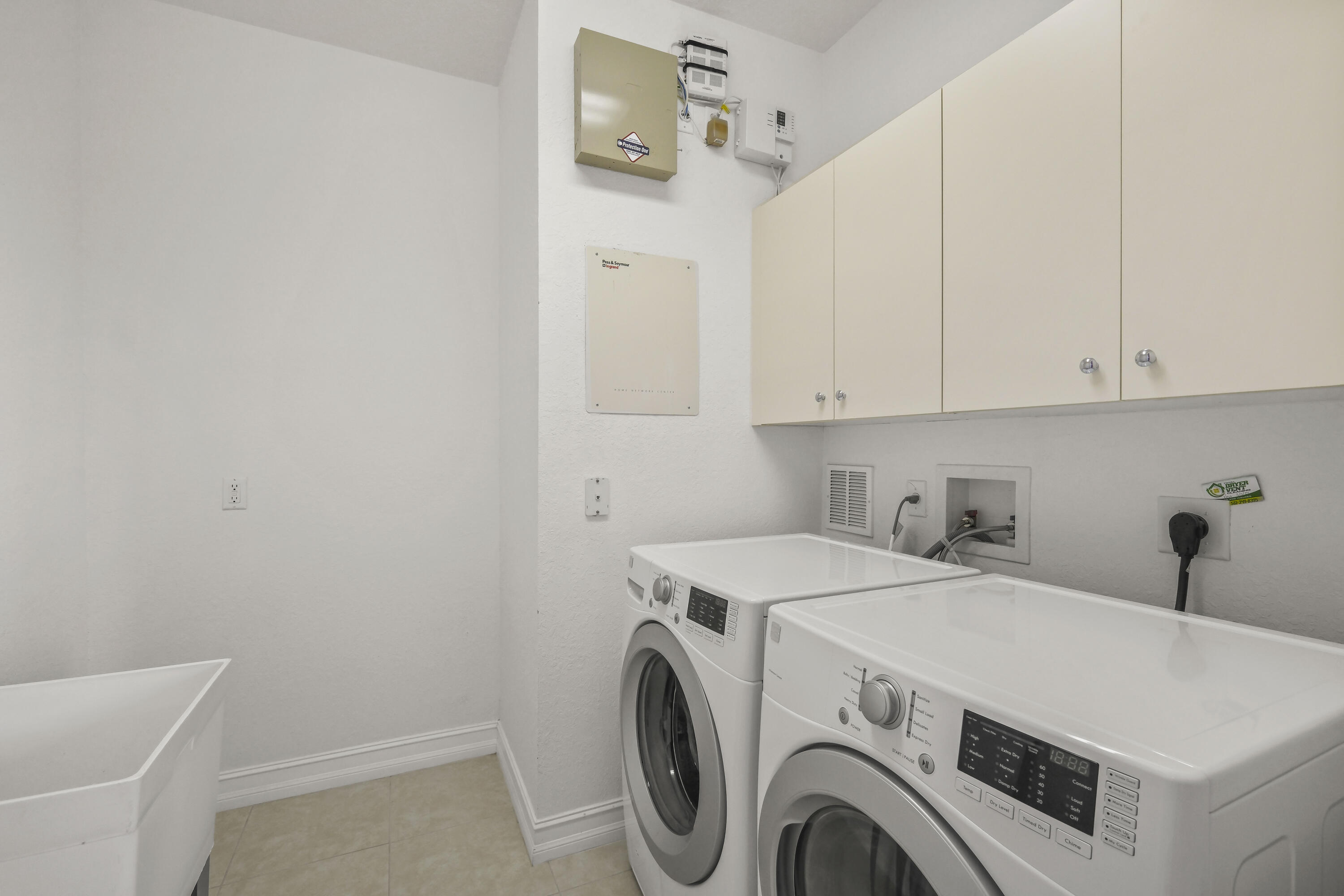 8620 Cobblestone Point Circle Boynton Beach, FL 33472 - Photo 38 of 42 a utility room with dryer and washer