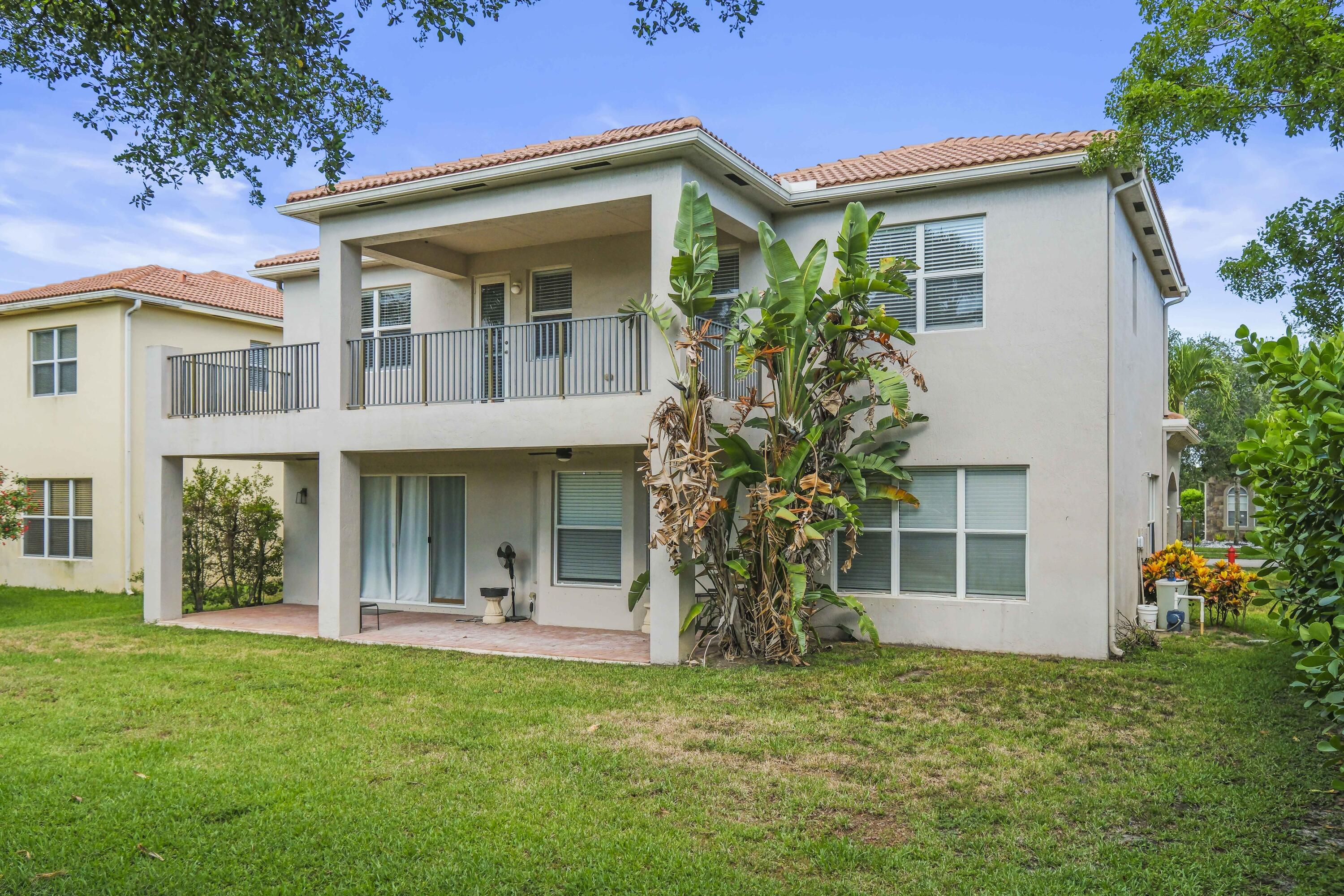 8620 Cobblestone Point Circle Boynton Beach, FL 33472 - Photo 41 of 42 a view of a house with a yard