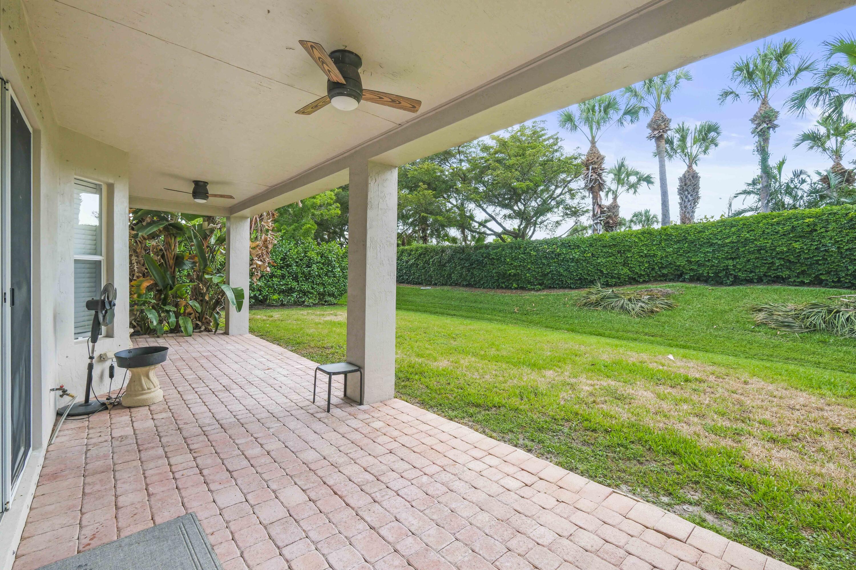 8620 Cobblestone Point Circle Boynton Beach, FL 33472 - Photo 42 of 42 a view of a porch with a backyard