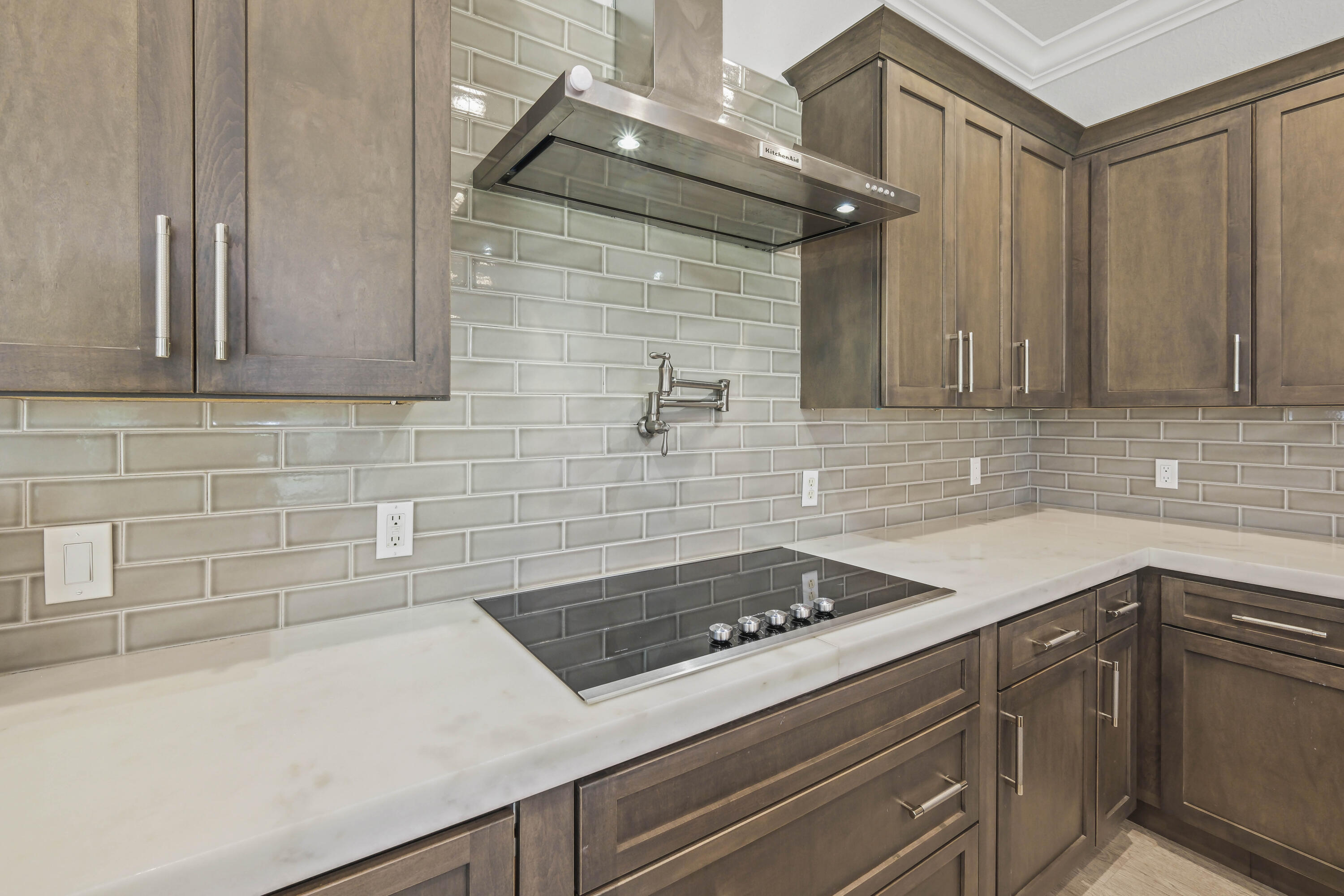8620 Cobblestone Point Circle Boynton Beach, FL 33472 - Photo 10 of 42 a kitchen with a sink stove and cabinets