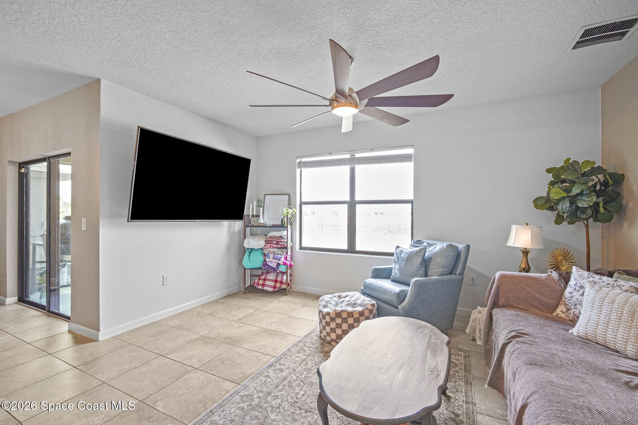 3818 Loggerhead Lane Mims, FL 32754 - Photo 13 of 30 13-web-or-mls-LOGGERHEAD_LIVING6
