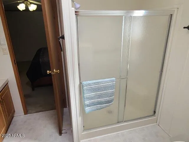 an empty room with closet and mirror