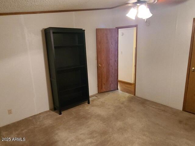 301 South Signal Butte Road, Unit 3 Apache Junction, AZ 85120 - Photo 20 of 34 an empty room with closet and mirror