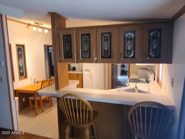 301 South Signal Butte Road, Unit 3 Apache Junction, AZ 85120 - Photo 6 of 34 a bedroom with a bed and a table