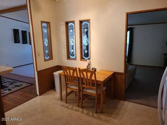 a view of a dining room with furniture