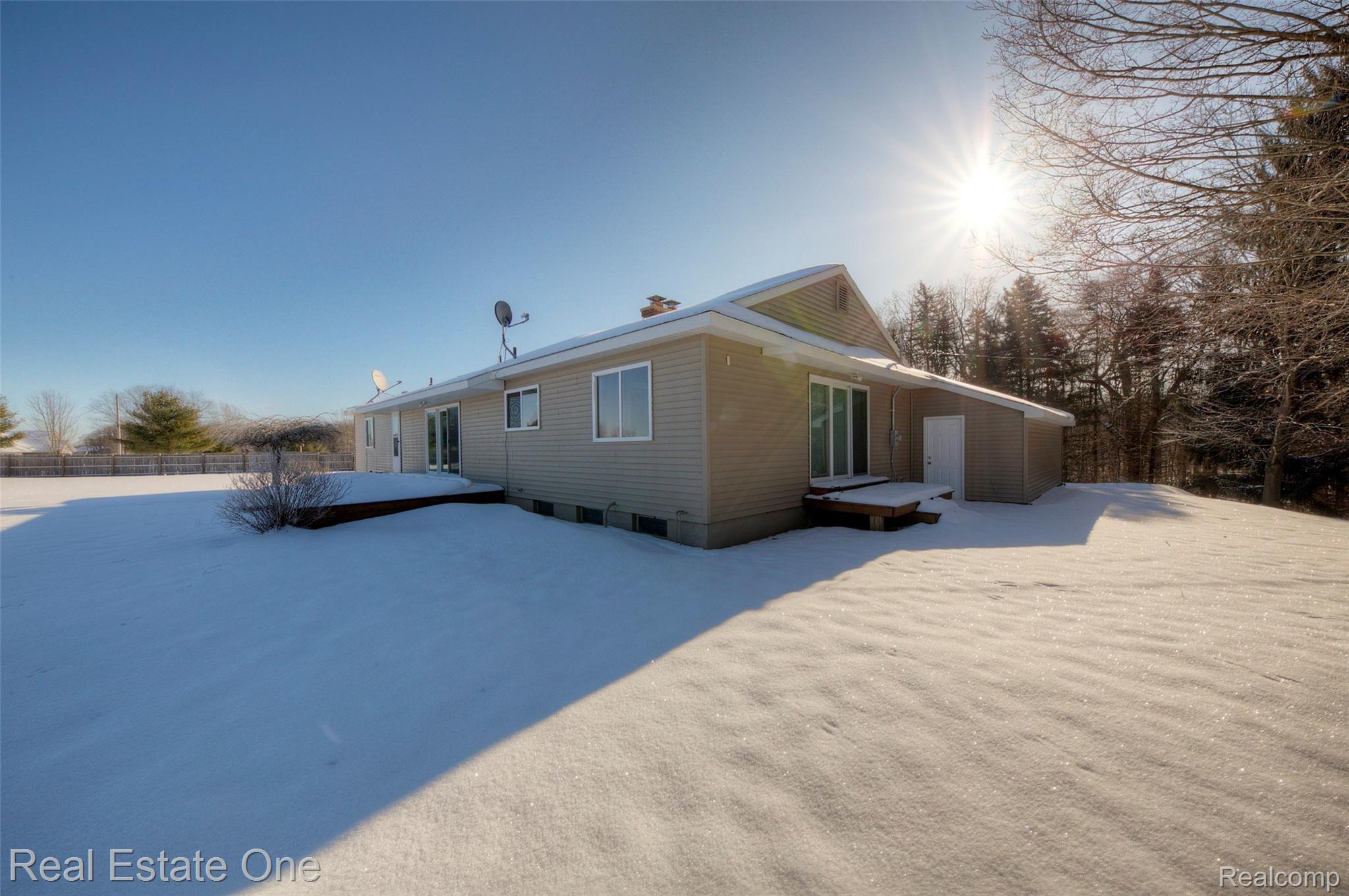 21500 Wasson Road Howell, MI 48843 - Photo 40 of 44 Back view with both decks