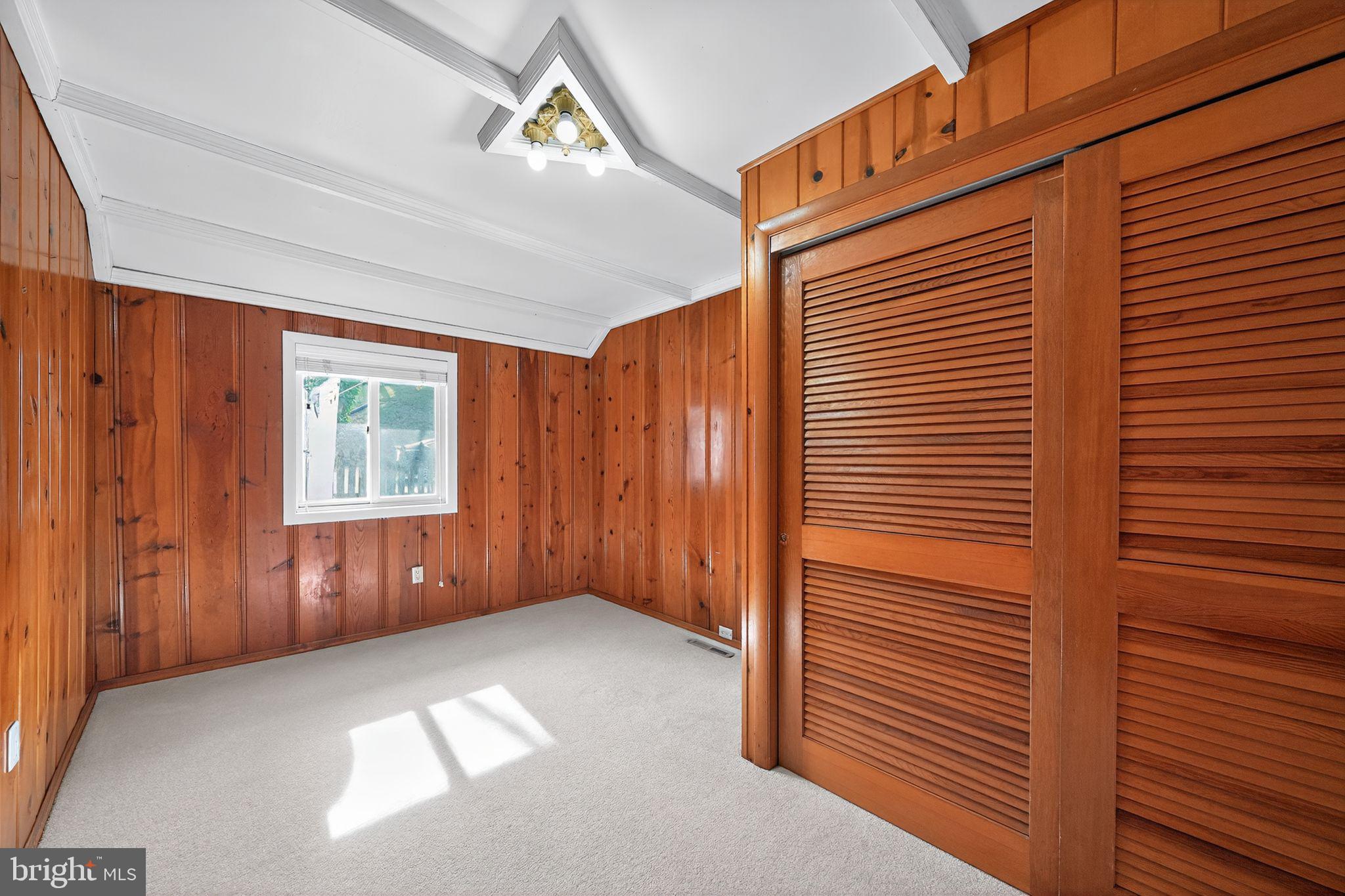 7523 B Street Chesapeake Beach, MD 20732 - Photo 14 of 29 a view of an empty room with a window