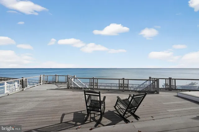 a view of a balcony with chairs