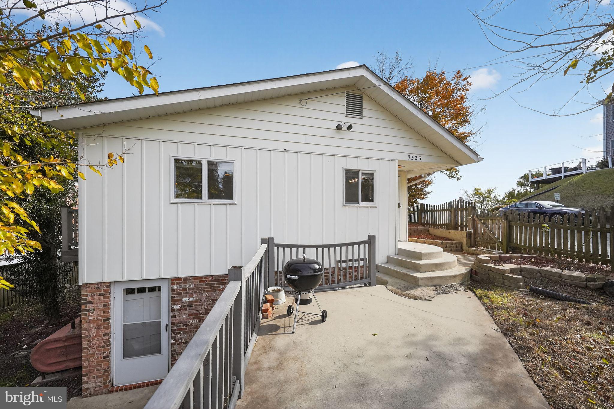7523 B Street Chesapeake Beach, MD 20732 - Photo 22 of 29 a backyard of a house with seating space
