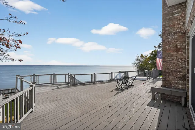 a view of a balcony with chairs