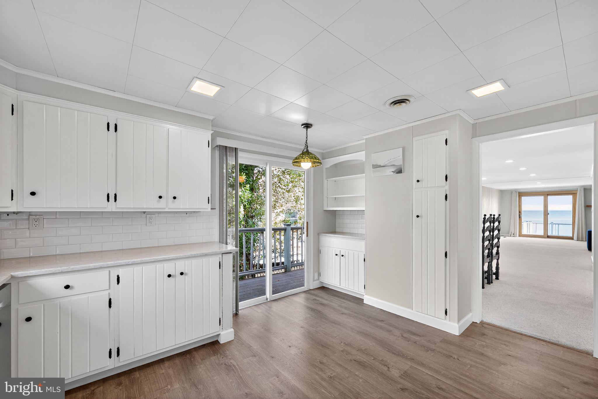 7523 B Street Chesapeake Beach, MD 20732 - Photo 6 of 29 a view of a kitchen with wooden floors