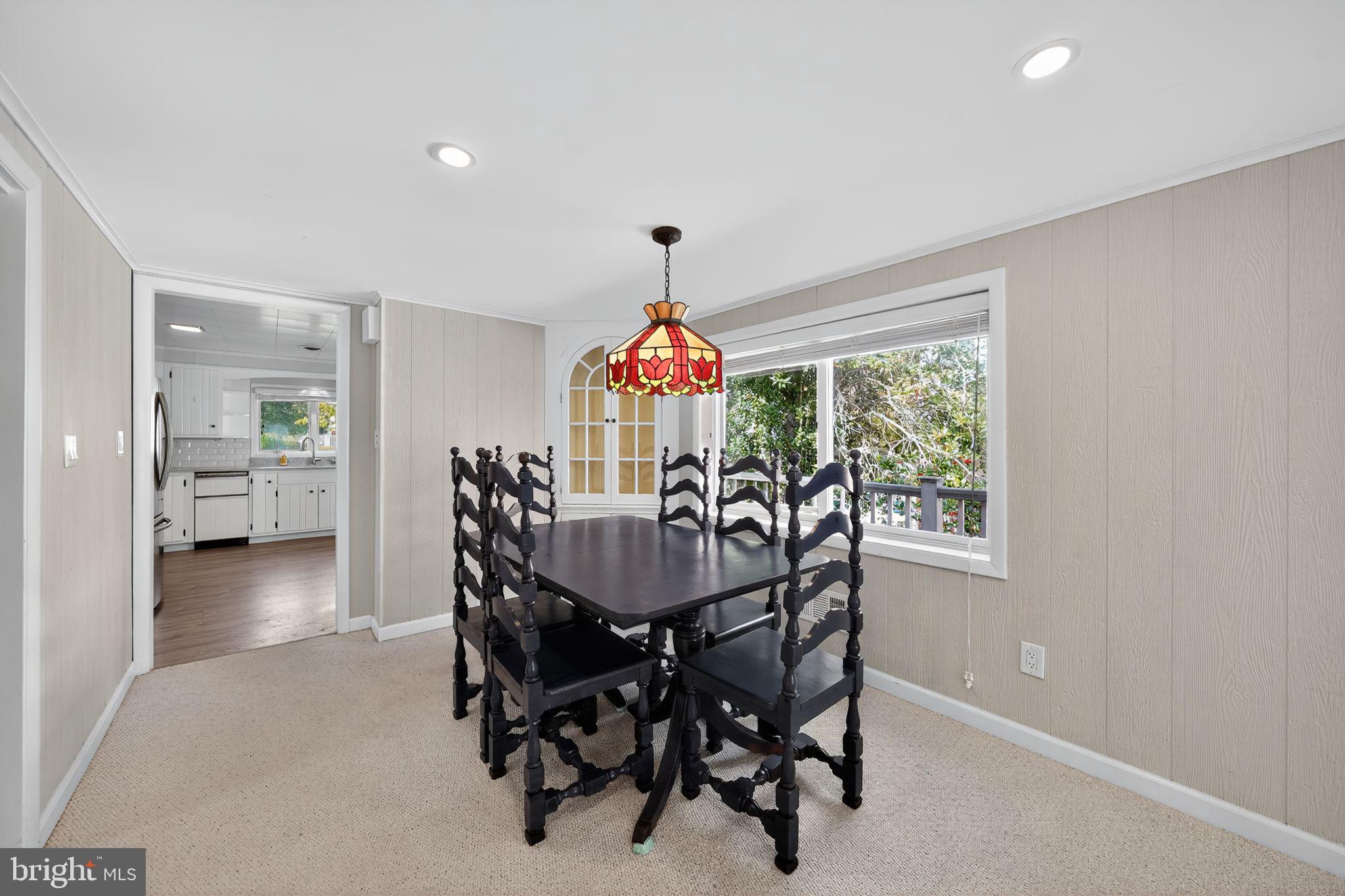 7523 B Street Chesapeake Beach, MD 20732 - Photo 9 of 29 a dining room with furniture and window