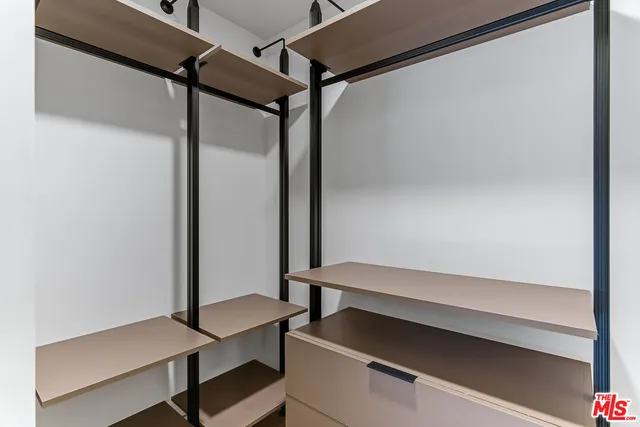 a view of room with a table and a chair