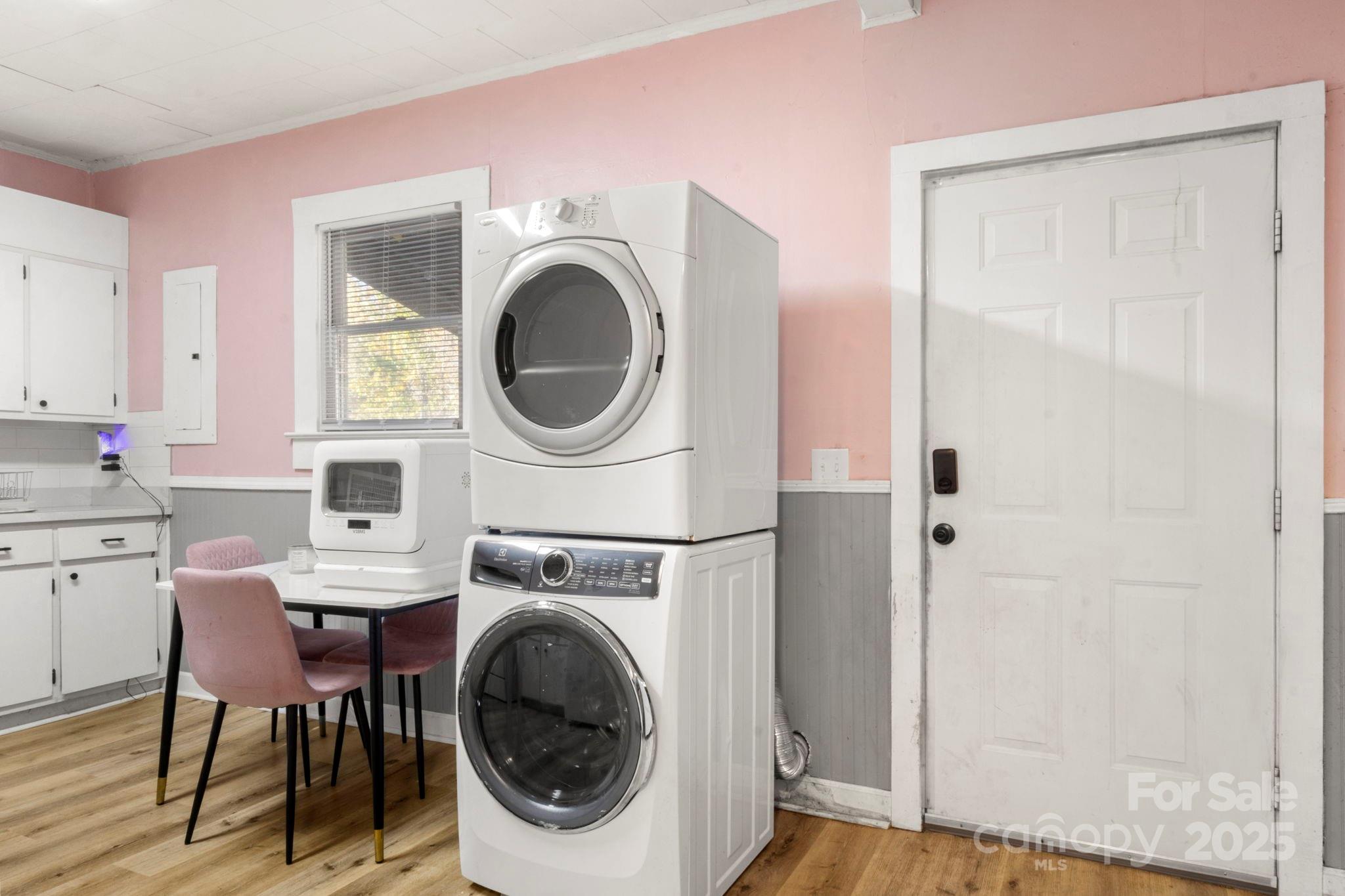 204 Shelby Street Hickory, NC 28601 - Photo 18 of 22 a view of a hallway with washer and dryer