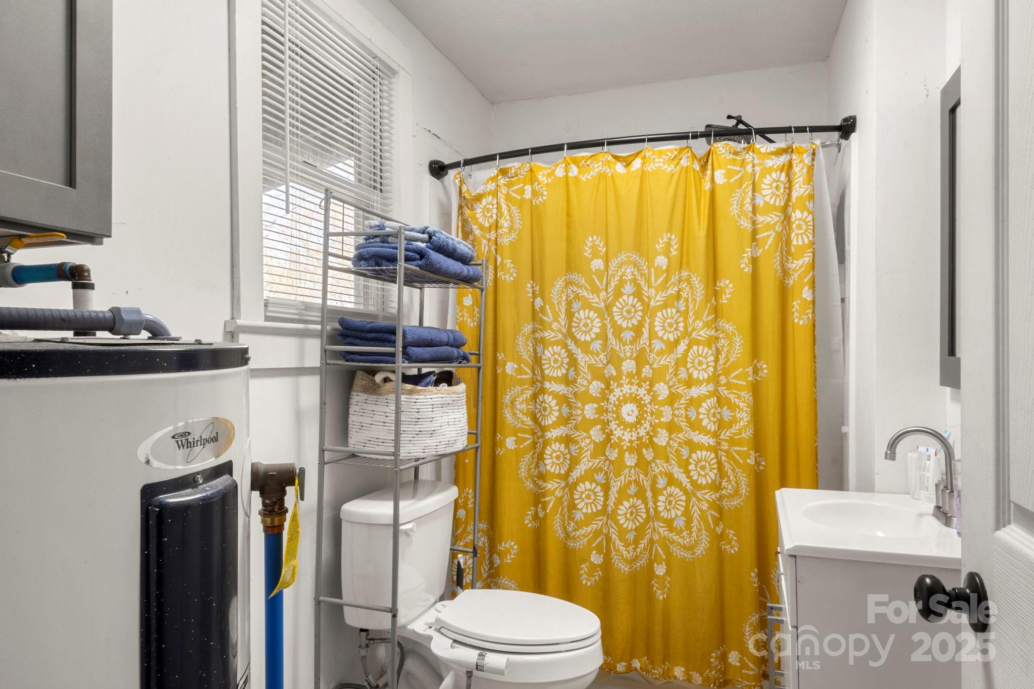 204 Shelby Street Hickory, NC 28601 - Photo 22 of 22 a bathroom with a sink toilet and shower