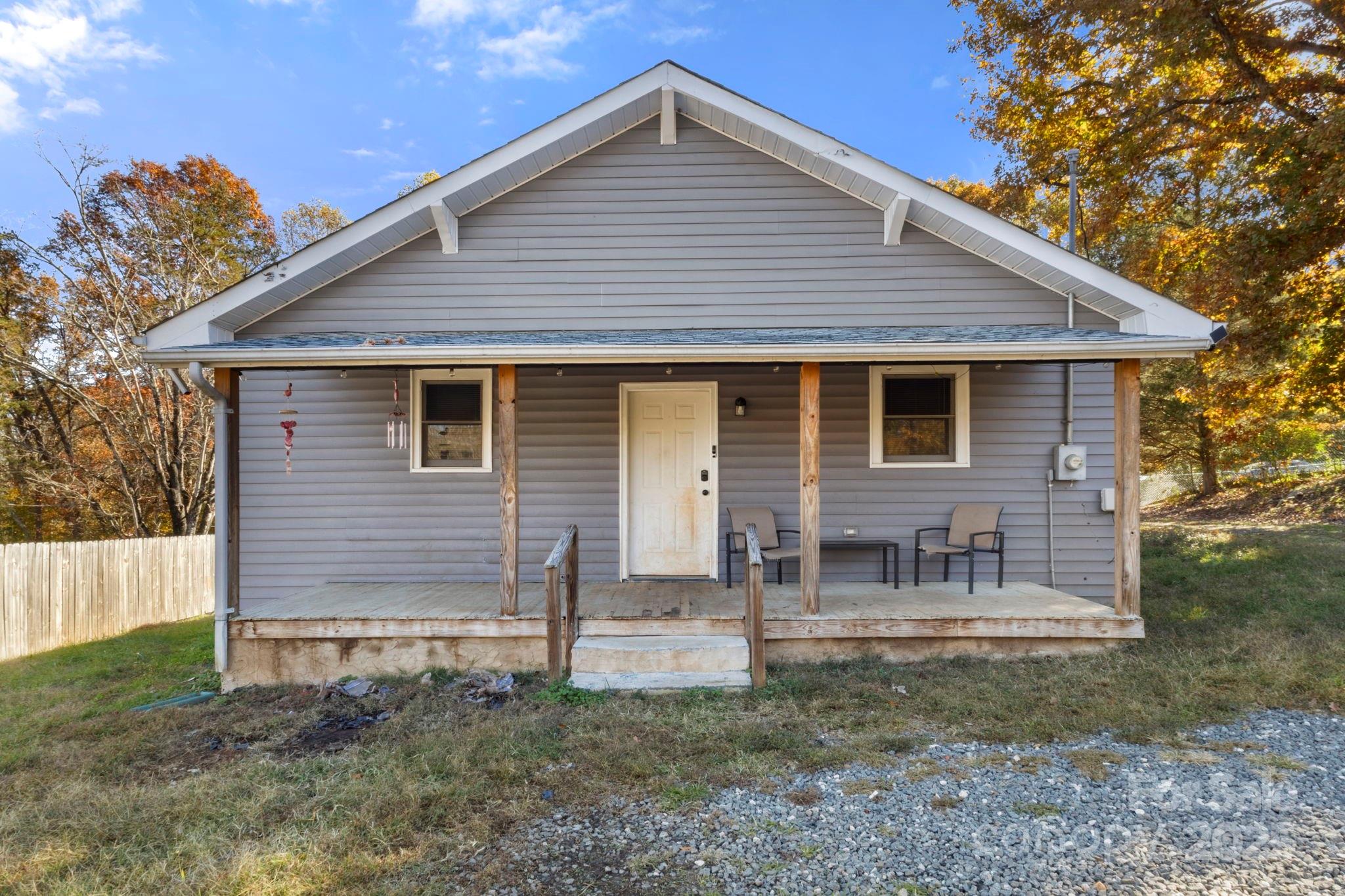 204 Shelby Street Hickory, NC 28601 - Photo 7 of 22 a view of a house with a yard